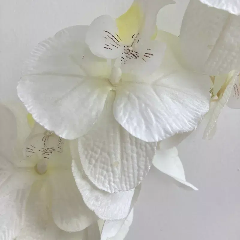 wedding centerpiece with faux orchids