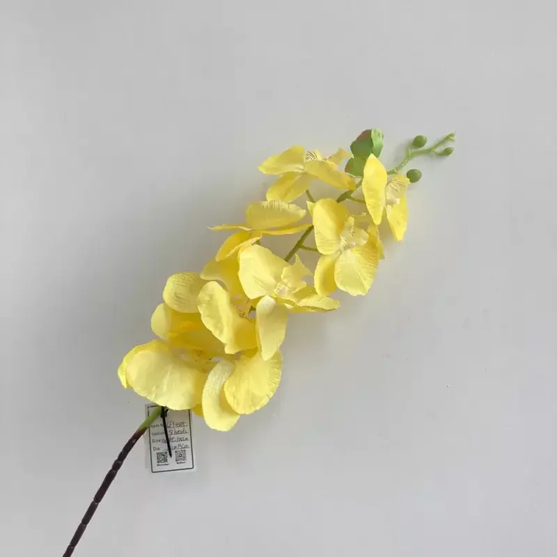 realistic faux phalaenopsis centerpiece